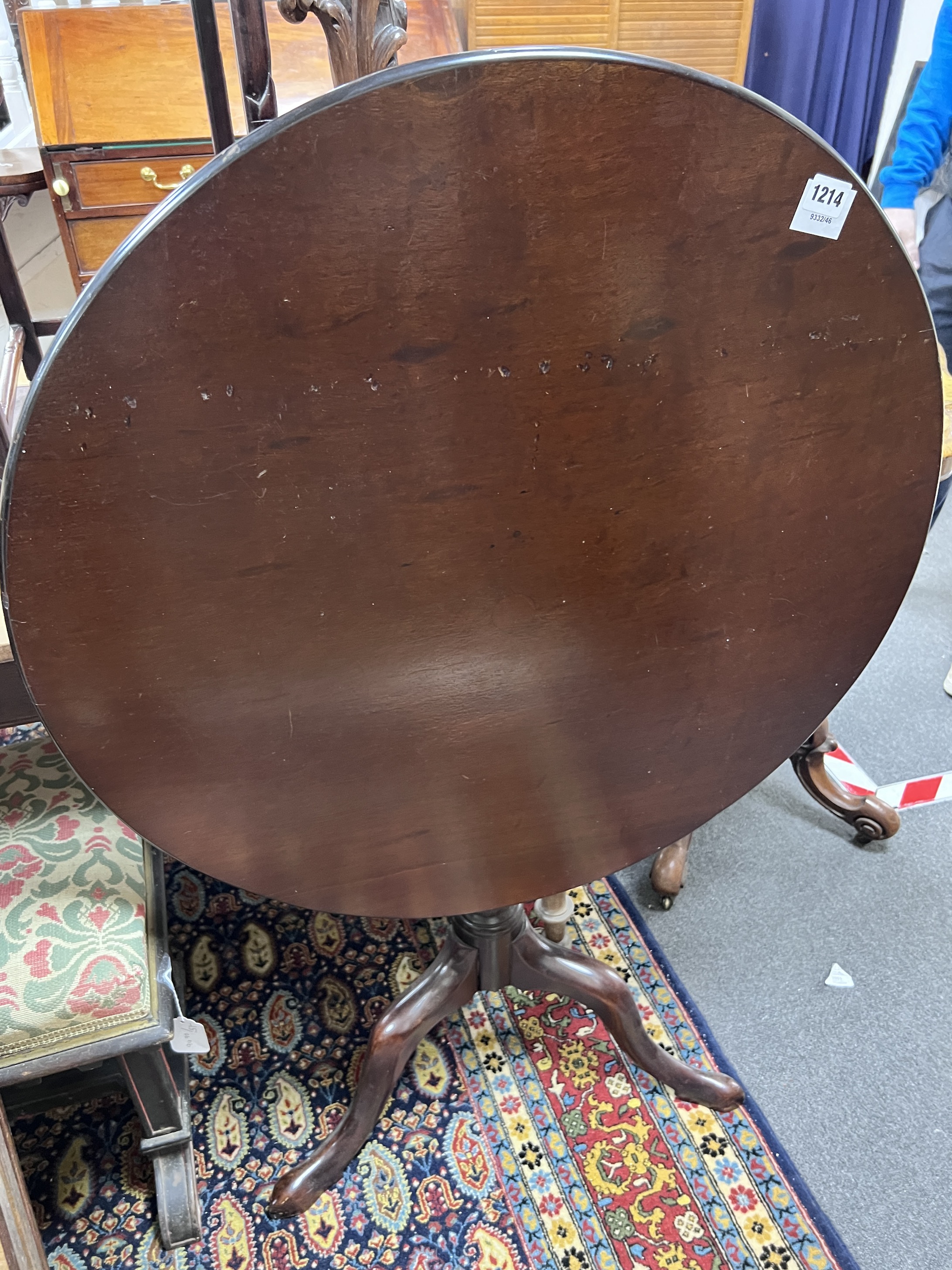 A George III mahogany tilt top tea table with tripod base, diameter 76cm